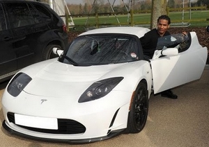 people-florent-malouda-tesla-roadster-assurance.jpg